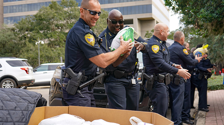 Officers staffing a turkey drive